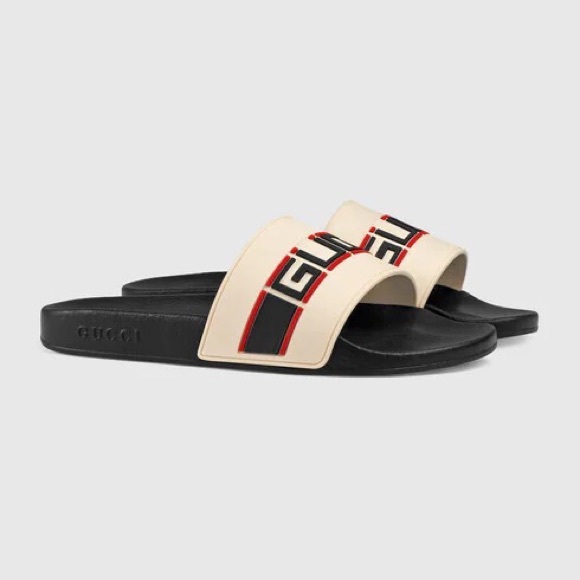 Women’s GUCCI rubber stripe slide.